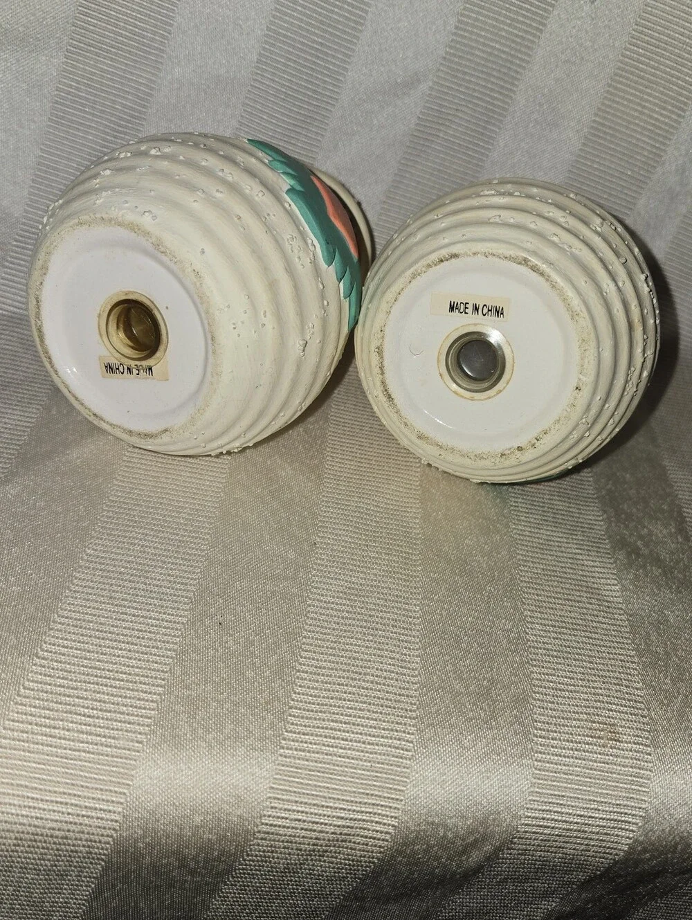 Handcrafted Southwestern Salt and Pepper Shakers with Teal and Coral Accents.